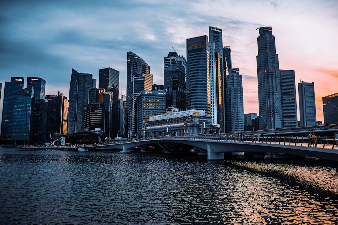 A global financial district skyline at blue hour.