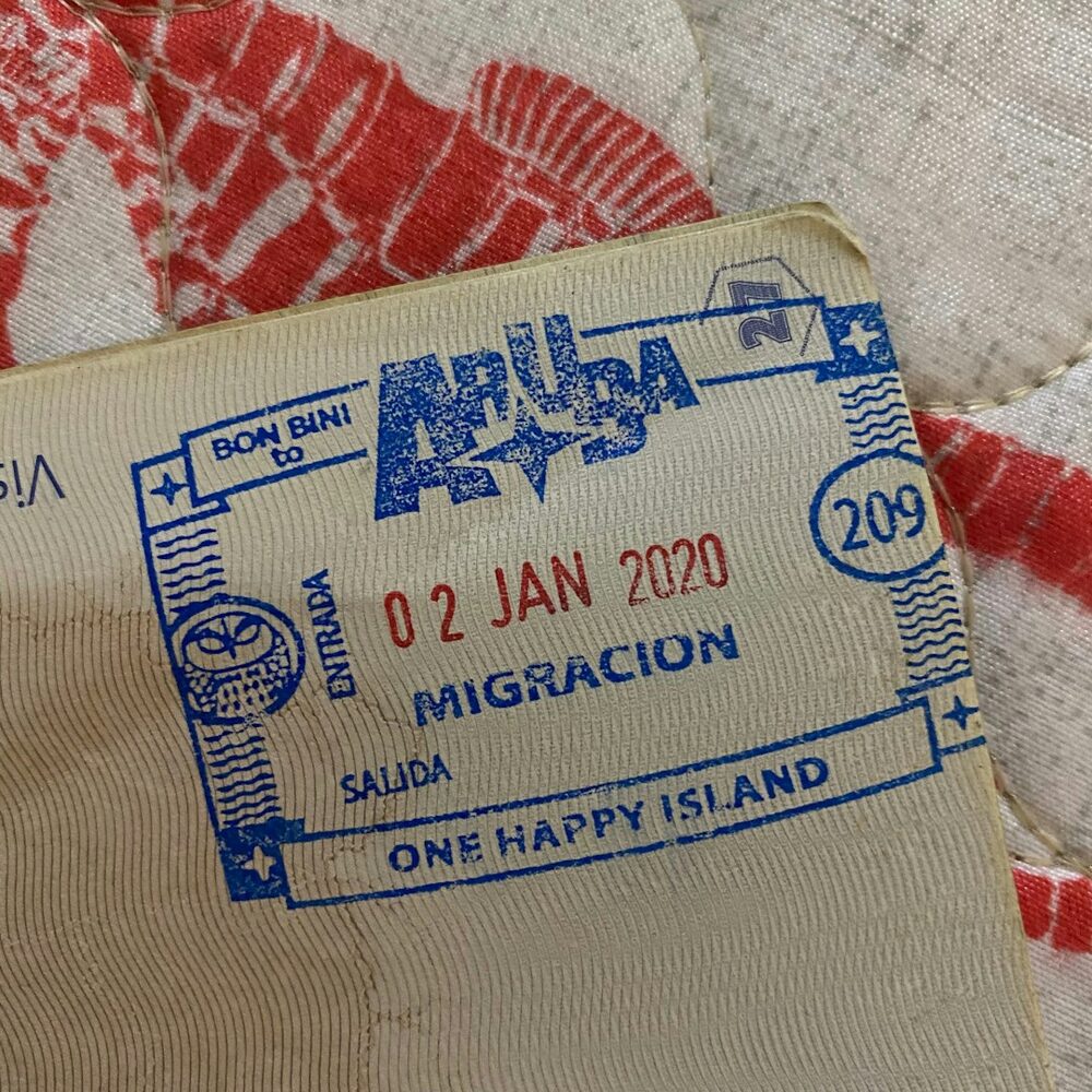 A well-stamped passport, symbol of global mobility.